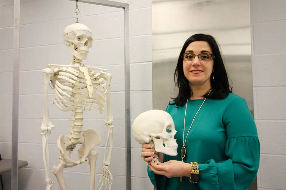 MariaTeresa A. Tersigni-Tarrant holding a skull